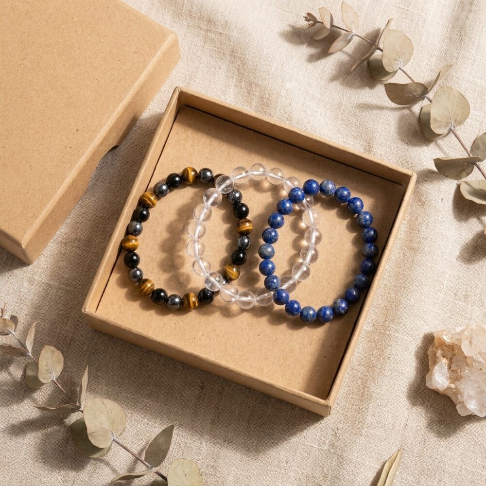 Nazar Raksha Combo flat lay lifestyle photo in gift box - Triple Protection Sphatik and Lapis Lazuli bracelet set