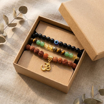 Maha Dhan Yog Combo flat lay lifestyle photo in gift box - Rudraksha Wealth and Evil Eye Protection bracelet set