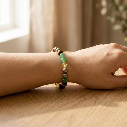 Money Magnet Bracelet worn on wrist lifestyle photo on wood surface with natural light